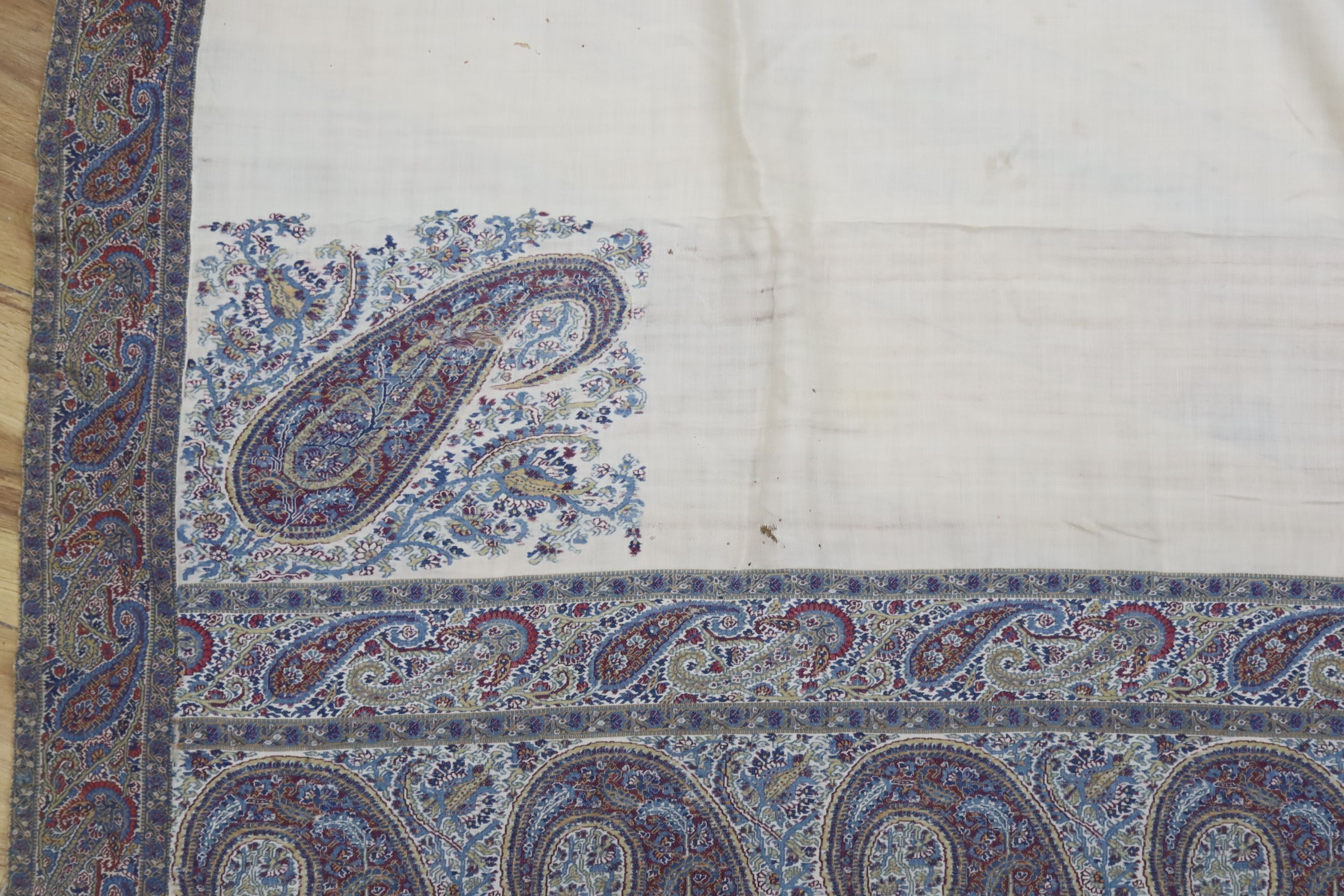 A 19th century Paisley bordered summer shawl